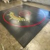 AK Athletic Equipment CLEARANCE 14' X 14' X 1 3/8" Roll Up Wrestling Mat - Black With Red Circles And Logo Wrestling Mats