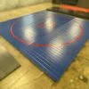 AK Athletic Equipment Wrestling Mats CLEARANCE 14' X 14' X 1 3/8" Roll Up Wrestling Mat - BLUE WITH RED CIRCLES